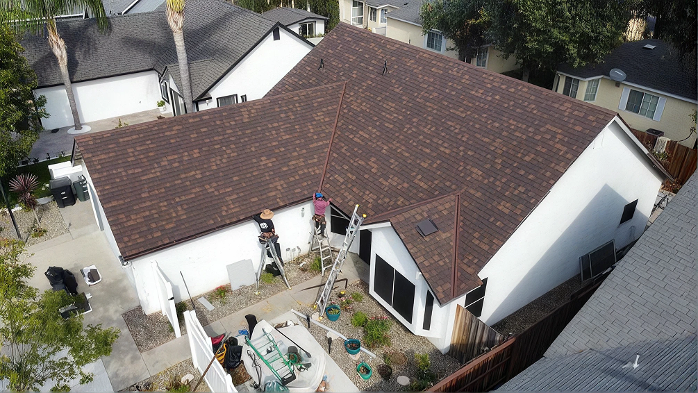 After: finished shingle roof